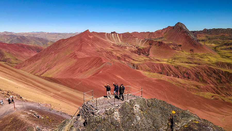 astonishing view from the summit over Red Valley, Rainbow Mountain and Red Valley