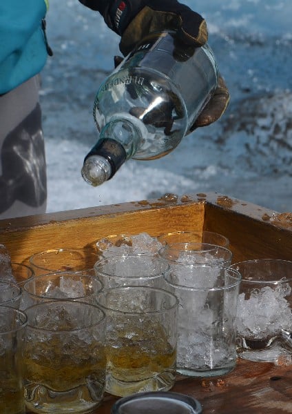 getting served Alcohol with ice from the Perito Moreno Glacier during the Minitrek