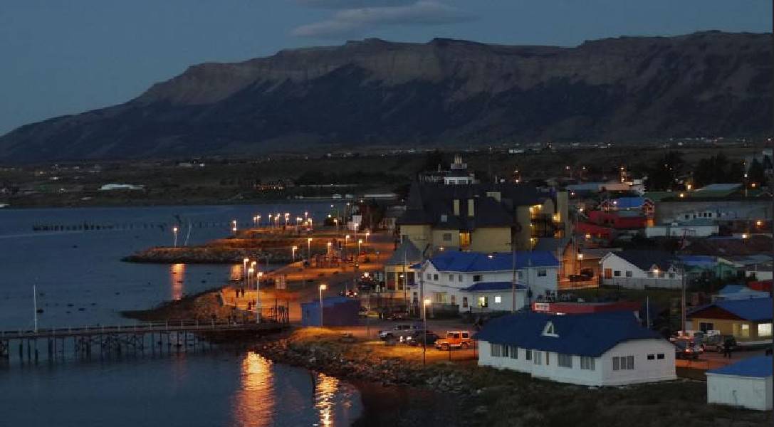Port in the evening. Puerto Natales on Two Wheels Tour