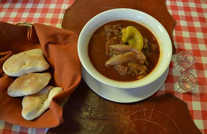 Adobo pork stew served with the typical bread 'Tres Puntas'