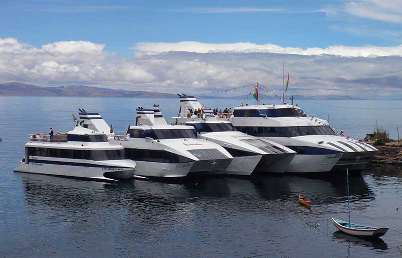 Four catamarans on the pier of Copacabana, Lake Titicaca