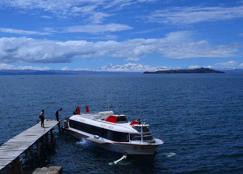 Hydrofoil anchored on a pier of Moon Island on  Lake Titicaca Bolivia