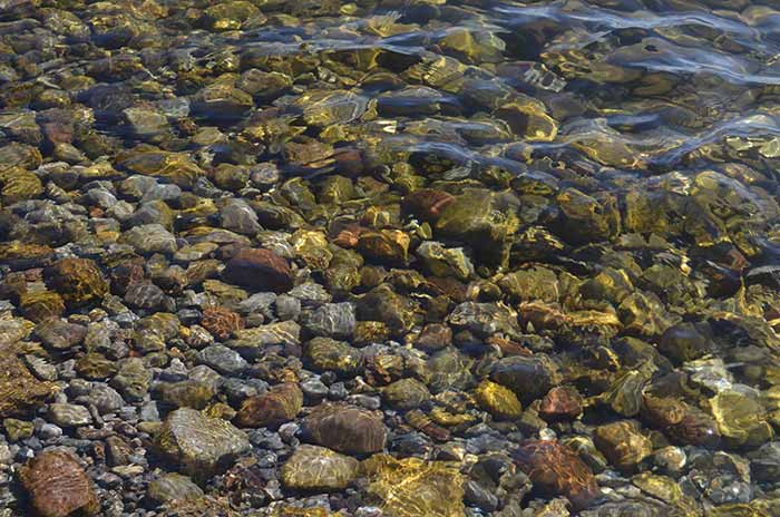 Lake Titicaca & Puno, crystal clear water on the shores of Luquina