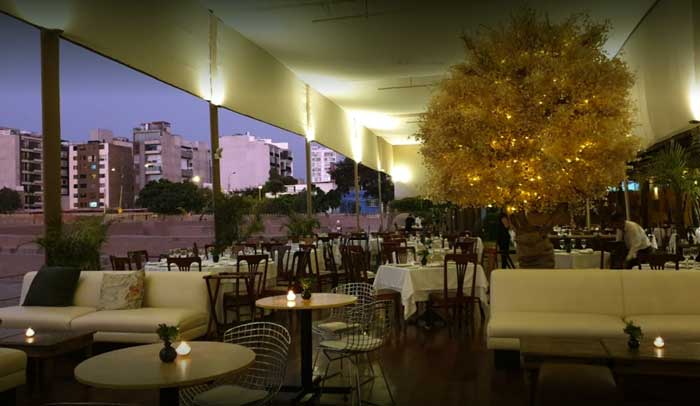 The terrace of La Huaca Restaurant across the the pre-Inca pyramid of the same name