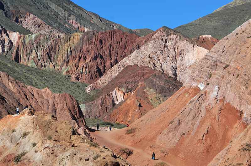 Salta Argentina - People strolling along the Purmamarca 7-color hill