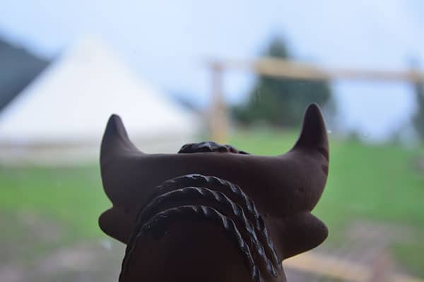 Pukara bull decor you see in the dining room when glamping in the Sacred Valley