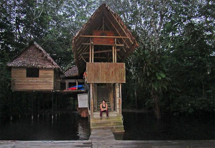 Cristina at the entrances of Treehouse Lodge in Iquitos