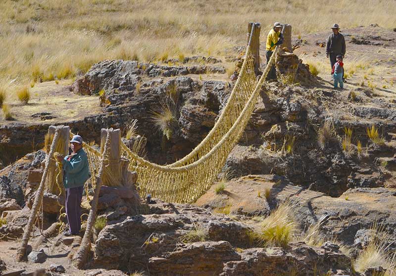 men weaving in peru