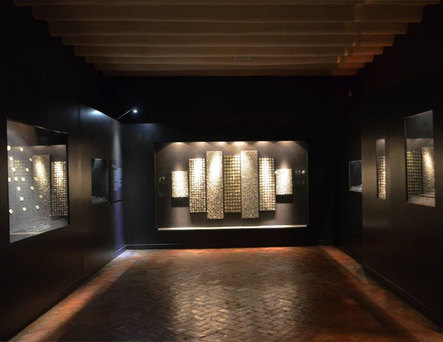 Golden room displaying gold pre-Inca artifacts at the MAP Museum in Cusco