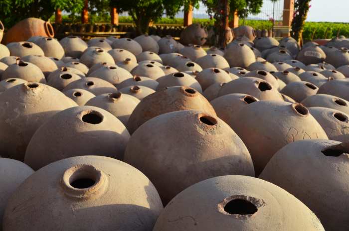 Ancient Pisco vessels illuminated by the sun rays
